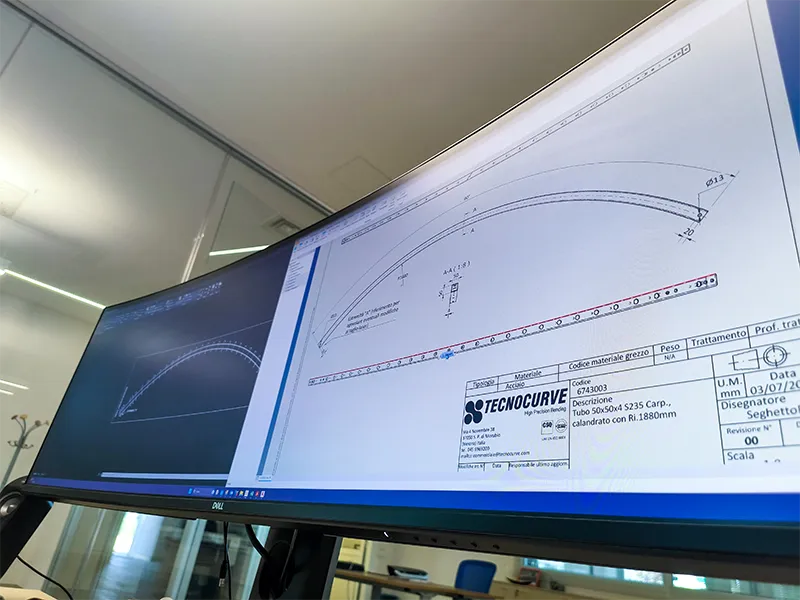 A technical drawing of a bent tube on a computer monitor